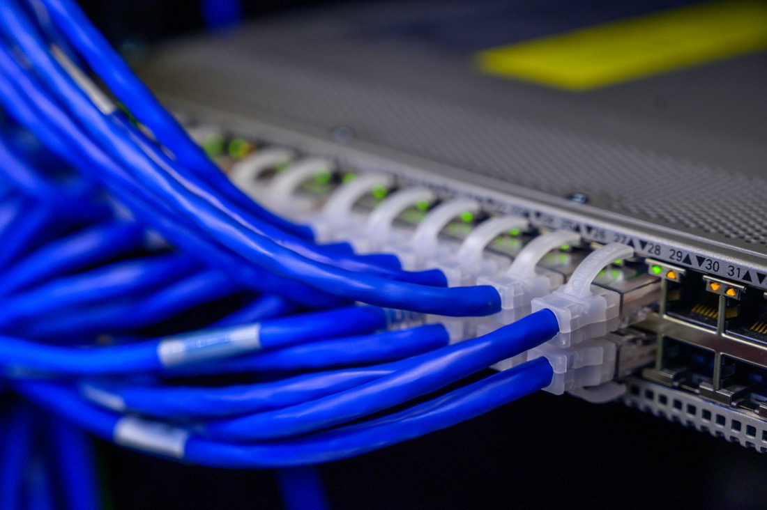 Network switch with blue ethernet cables